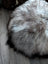 Cozy grey Icelandic sheepskin floor pouf pet bed