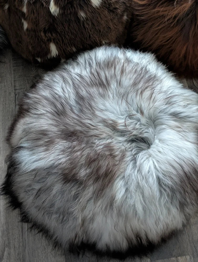 Grey Icelandic sheepskin floor pouf plush circular rug