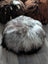 Grey Icelandic sheepskin floor pouf with soft fur texture
