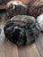 Shorn Icelandic sheepskin floor pouf in wolf faux fur
