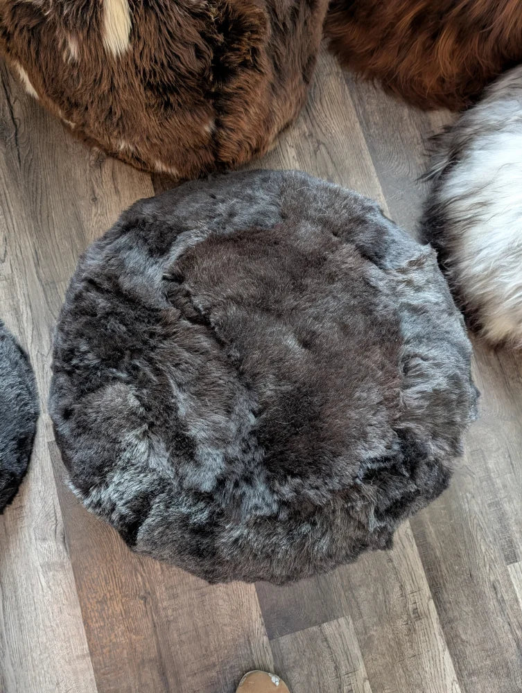 Shorn Icelandic sheepskin wolf floor pouf in plush gray fur