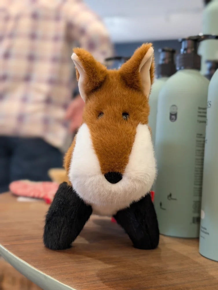 Frank the fox plush fox toy with brown white fur black paws and small black eyes perfect as a stuffed animal