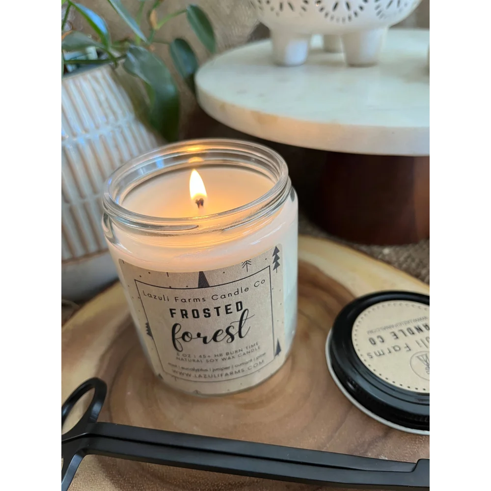 Frosted forest candle in glass jar with white label, natural soy wax