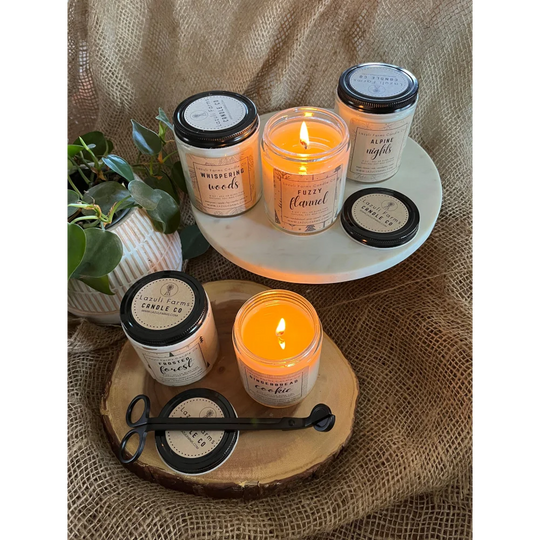 Fuzzy flannel candle set on wooden tray with white plates and scented soy wax jars