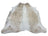 Gorgeous beige extra large cowhide rug with unique characteristics featuring creamy white and light beige rustic charm spots