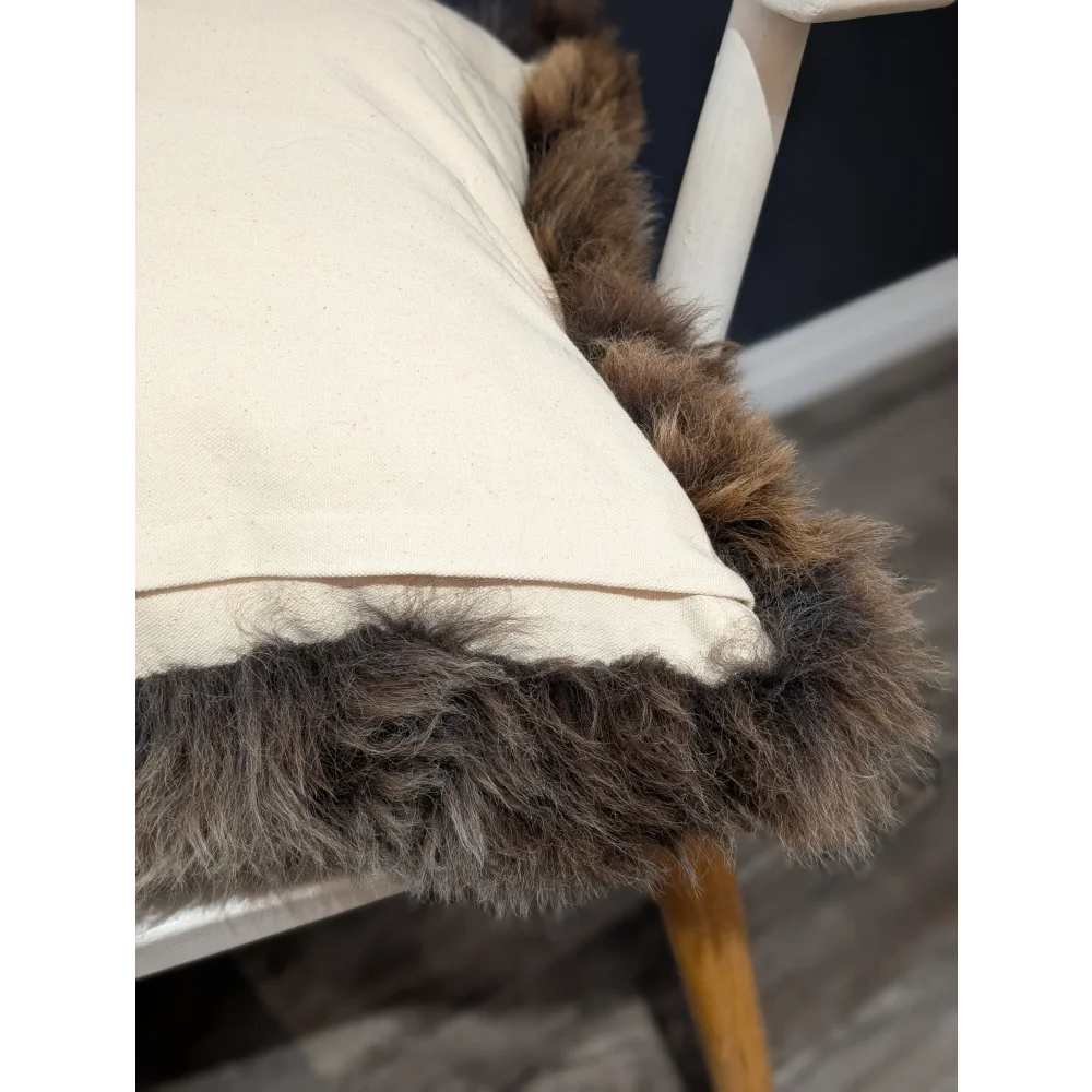 Gorgeous british sheepskin cushion with cream-colored unbleached cotton canvas and plush brown faux fur trim
