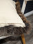 Gorgeous british sheepskin cushion with cream-colored unbleached cotton canvas and plush brown faux fur trim