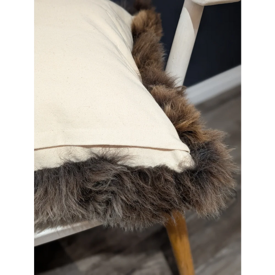 Gorgeous british sheepskin cushion with cream-colored unbleached cotton canvas and plush brown faux fur trim