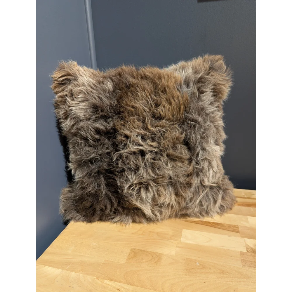 Gorgeous british sheepskin cushion with plush shaggy brown fur and unbleached cotton canvas backing