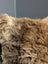 Gorgeous british sheepskin cushion with a plush brown sheepskin throw on unbleached cotton canvas backing