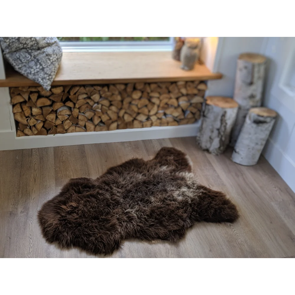 Gorgeous fluffy British sheepskin rug with natural brown texture