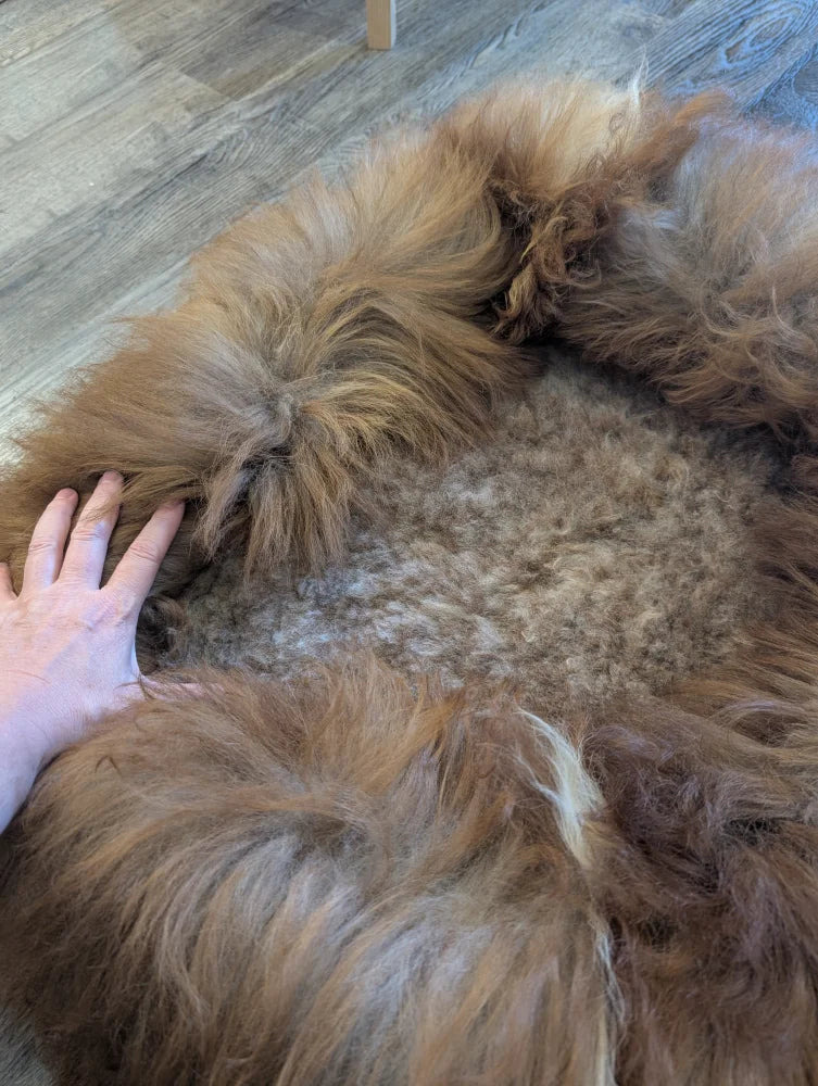 Brown fluffy sheepskin pet bed toy with soft textured wool