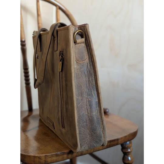 Gorgeous wool and leather bag with tan distressed leather, zipper pocket, brass hardware, and hand-tooled leather accents