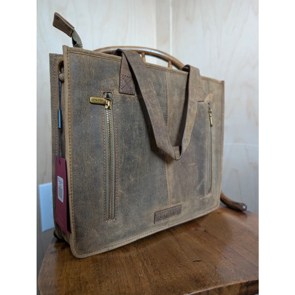 Gorgeous wool and leather bag with weathered brown leather, gold-tone zippers, sturdy handle, and hand-tooled leather accents