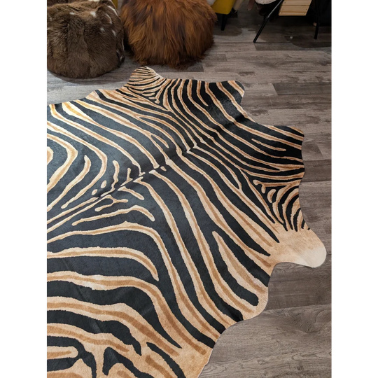 Black and tan zebra print large cowhide rug by angus oliver with unique characteristics for stylish decor