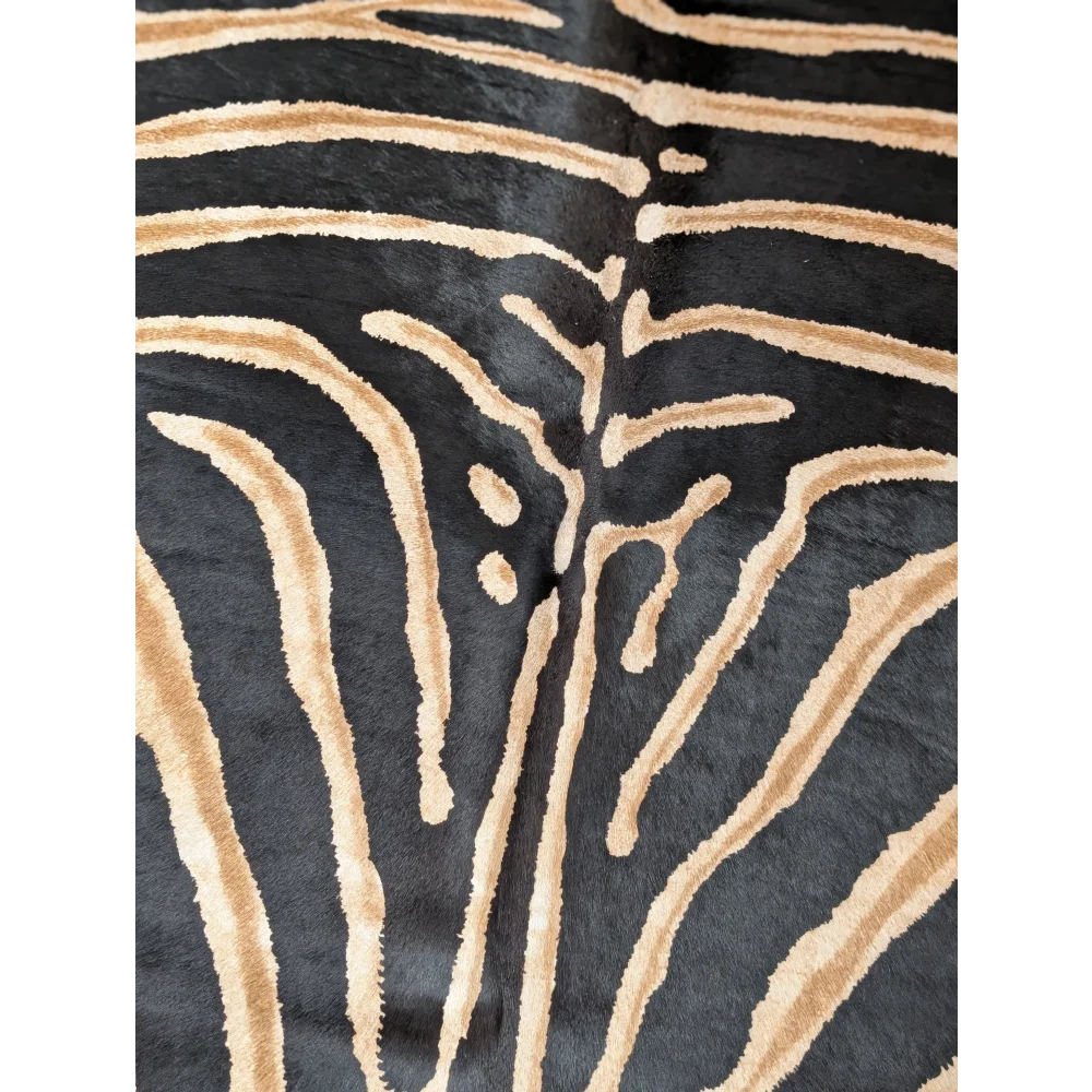 Gorgeous zebra printed cowhide rug by angus oliver with large cowhide and unique black and tan zebra print texture