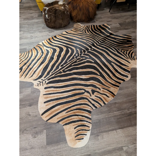 Gorgeous zebra printed cowhide rug by angus oliver with unique characteristics in bold black and tan faux leather