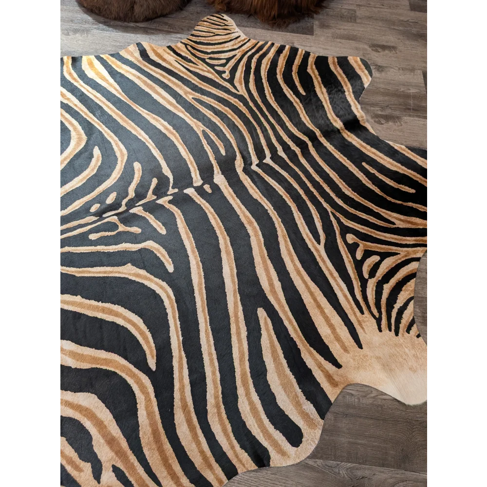 Gorgeous zebra printed cowhide angus oliver large cowhide with black and tan zebra print and unique characteristics