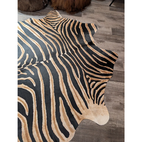 Black and tan zebra print large cowhide rug with unique characteristics by angus oliver perfect for stylish decor