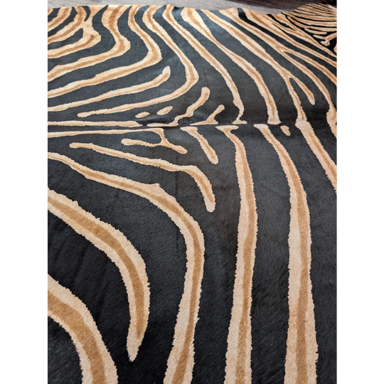 Gorgeous zebra printed cowhide rug with black and tan zebra stripes plush texture by angus oliver large cowhide with unique characteristics