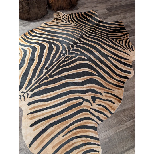 Gorgeous zebra printed cowhide rug by angus oliver with bold black and tan stripes and unique large cowhide texture