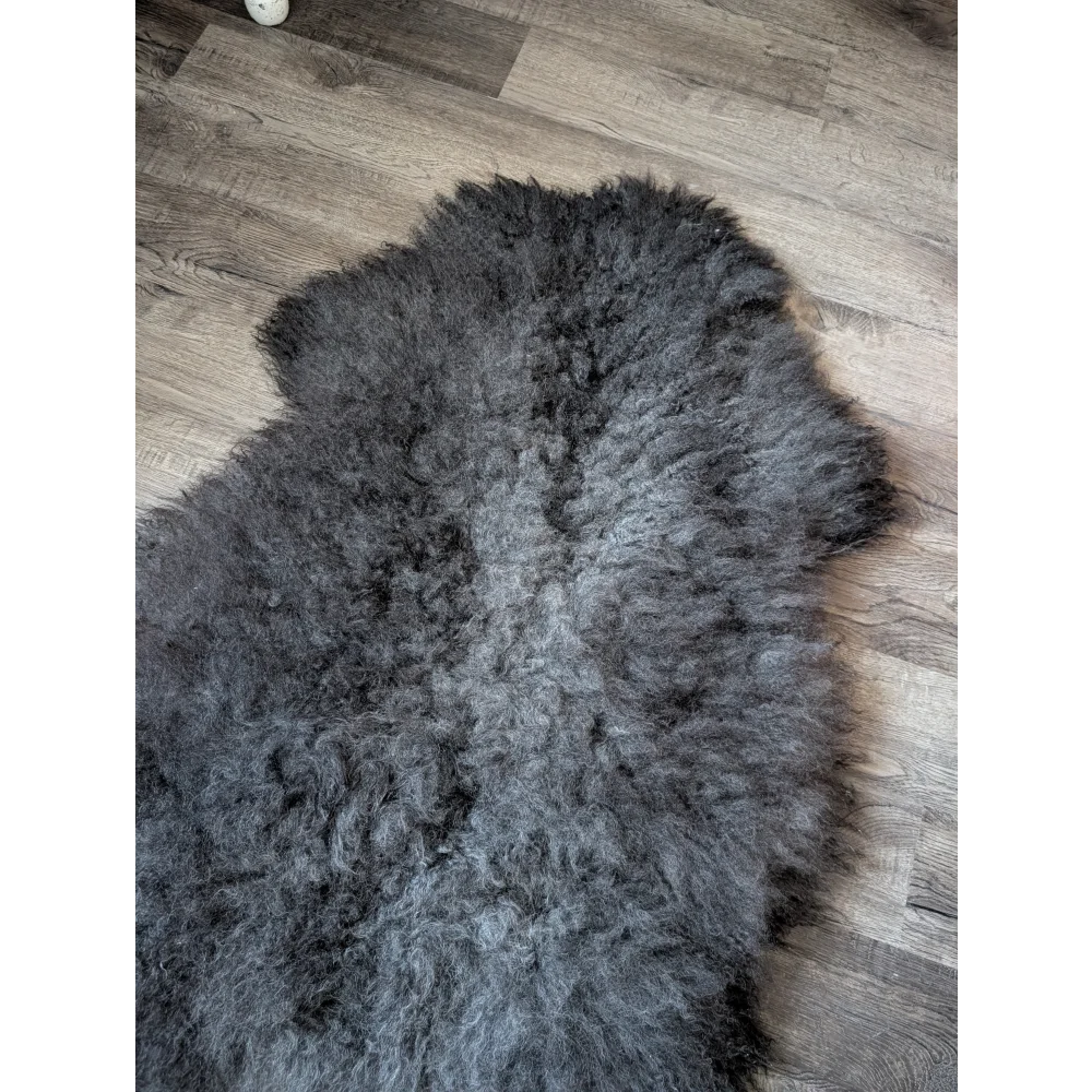Gots#10 53x34 massive Gotland sheepskin rug on wood floor
