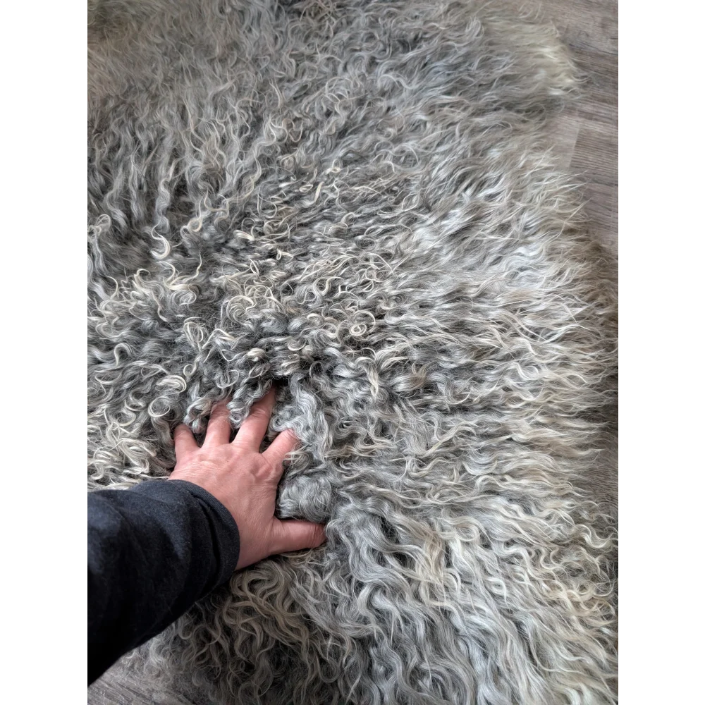 Grey fluffy Gotland sheepskin rug, 44x30 inches, soft natural texture