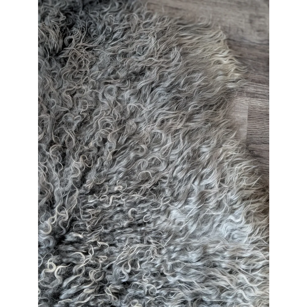 Gray curly Gotland sheepskin rug, 44x30in, soft natural texture