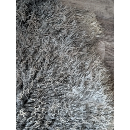 Gray curly Gotland sheepskin rug, 44x30in, soft natural texture