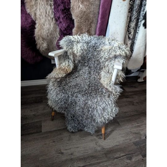 Gray fluffy Gotland sheepskin chair, 52x31, with wooden legs