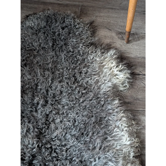 Grey fluffy Gotland sheepskin rug 52x31 with soft natural texture