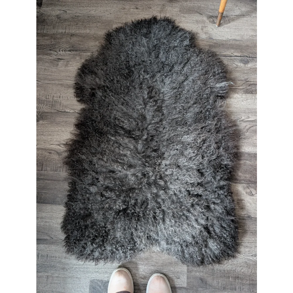 Gotland sheepskin rug 52x31 in charcoal gray with soft natural texture