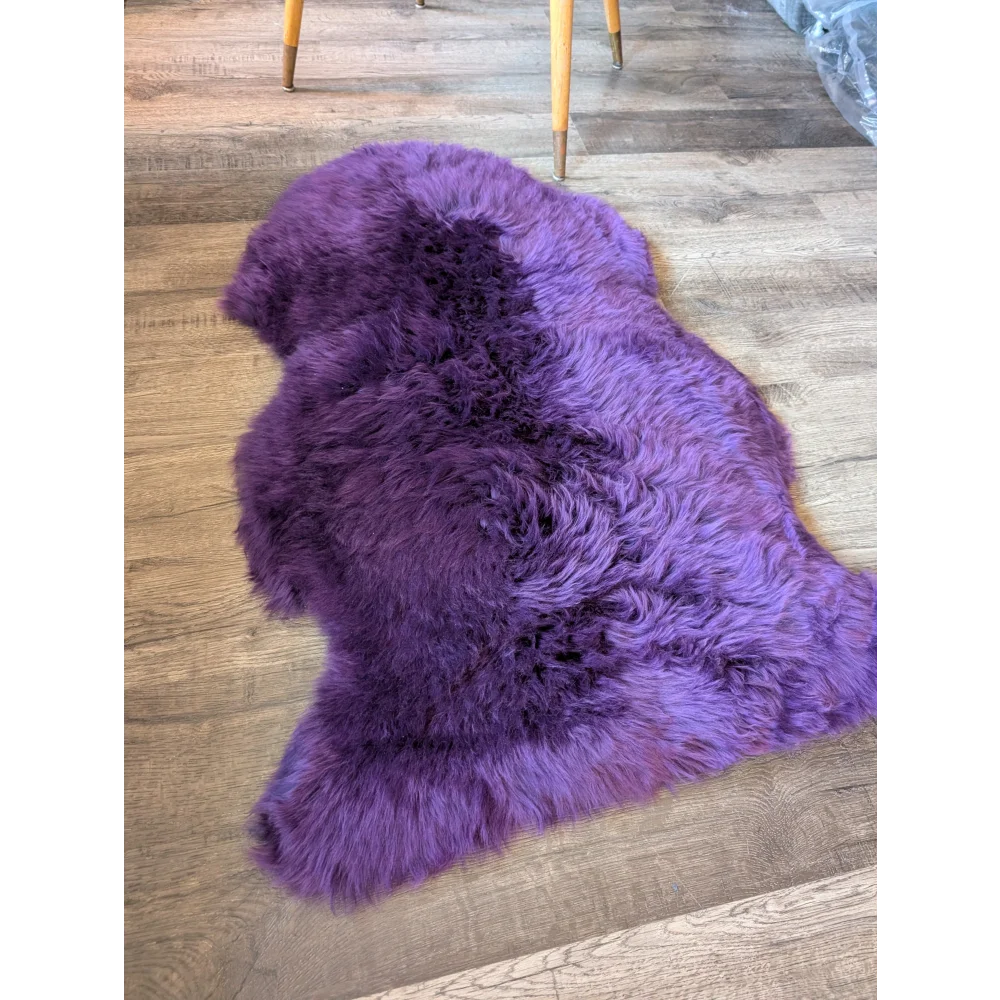 Gorgeous grape purple Merino sheepskin rug with soft natural texture