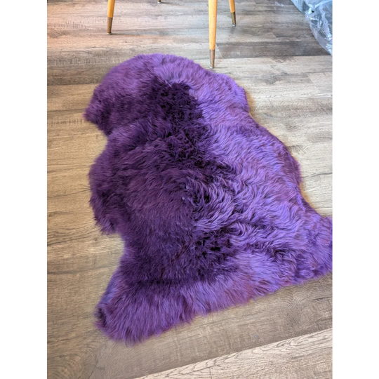 Gorgeous grape purple Merino sheepskin rug with soft natural texture