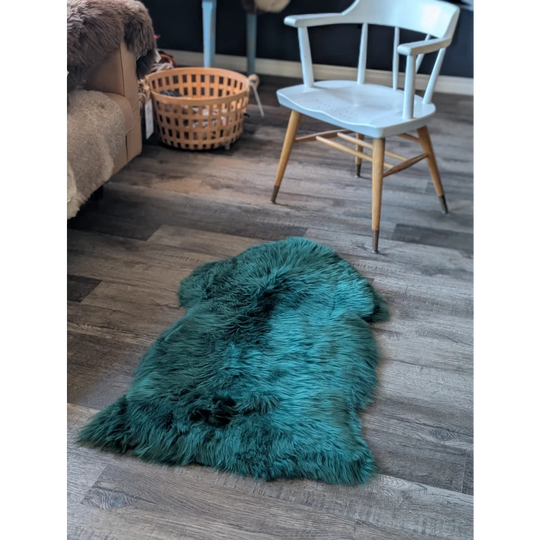 Gorgeous green merino sheepskin rug with teal faux fur plush texture