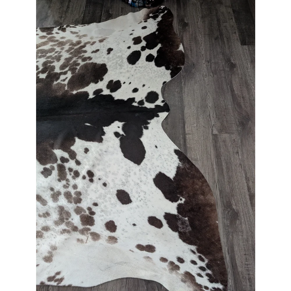 Greymix 895 extra large cowhide rug with white base and black brown spots showing natural raw leather texture