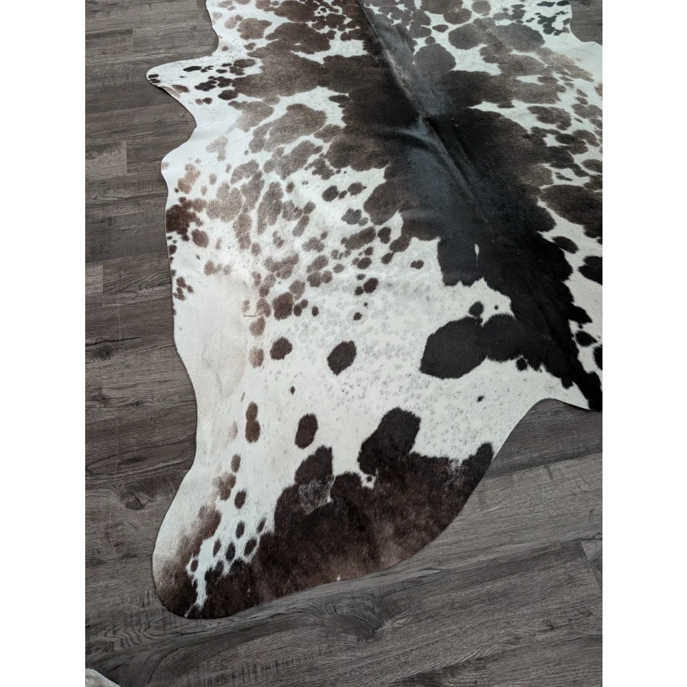 Greymix 895 extra large cowhide rug with black and dark brown spots on a creamy base 96 by 78 inches