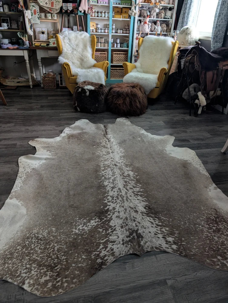 Brown and white extra large cowhide rug greymix#925 with natural irregular edges perfect for beautiful rugs