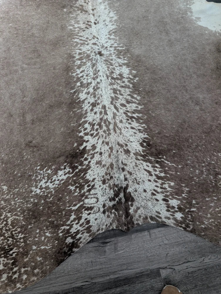 Brown and white spotted extra large cowhide rug greymix#925 with natural textured surface perfect for beautiful rugs