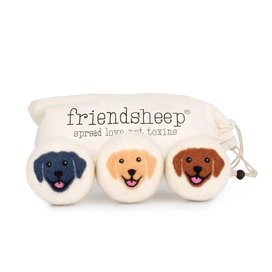 Happy Dogs eco wool dryer balls with embroidered sheep faces in blue, yellow, brown