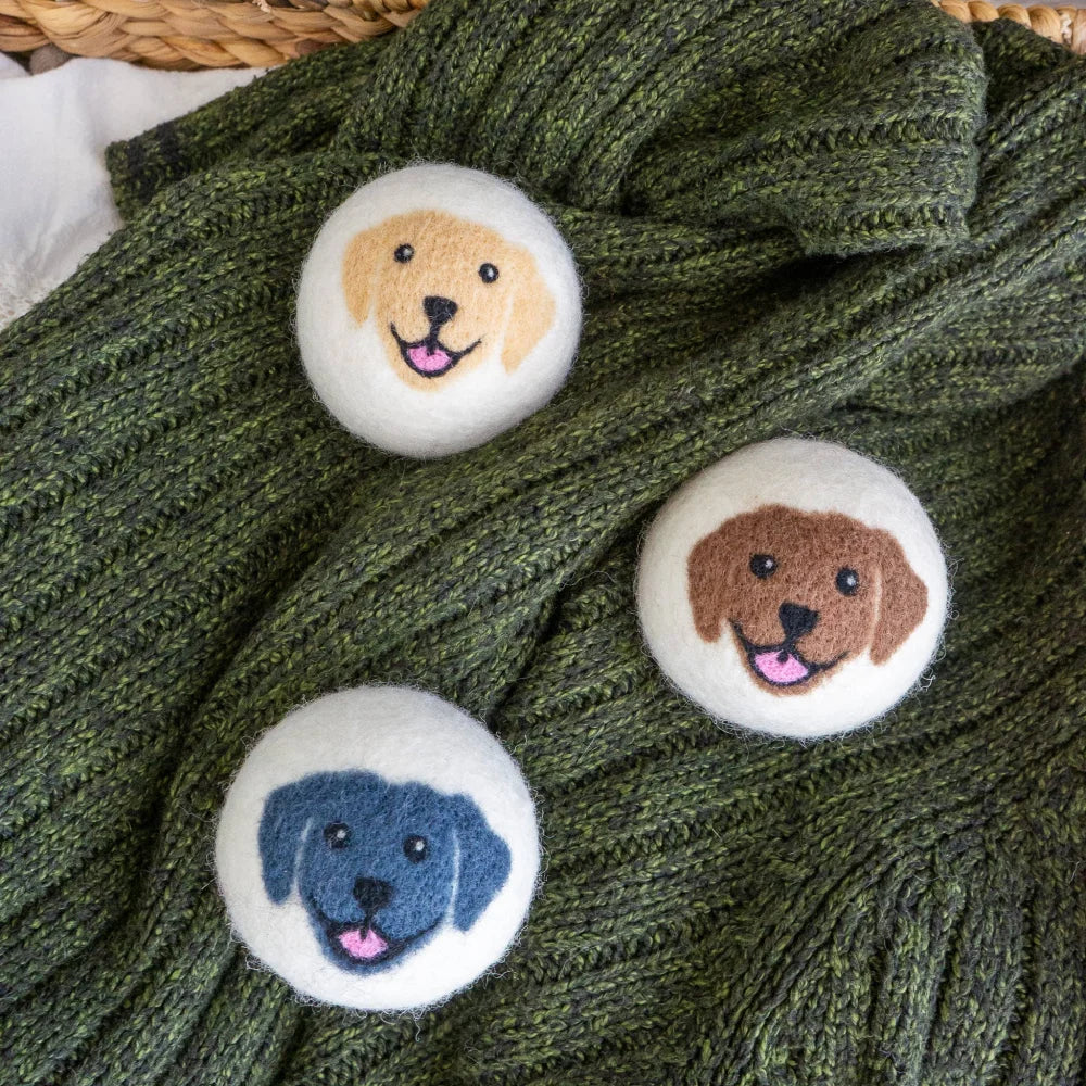 Happy Dogs eco dryer balls with green knitted scarf and felt dog buttons