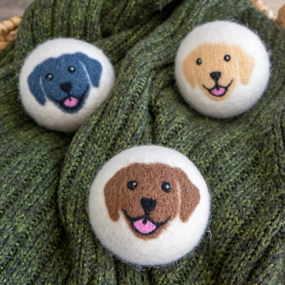 Green Happy Dogs eco dryer balls with knitted scarf and dog face buttons