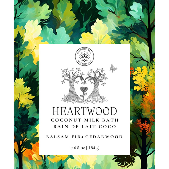 Heartwood coconut milk bath salt sachet by blooming wild botanicals with white label and black heart tree art
