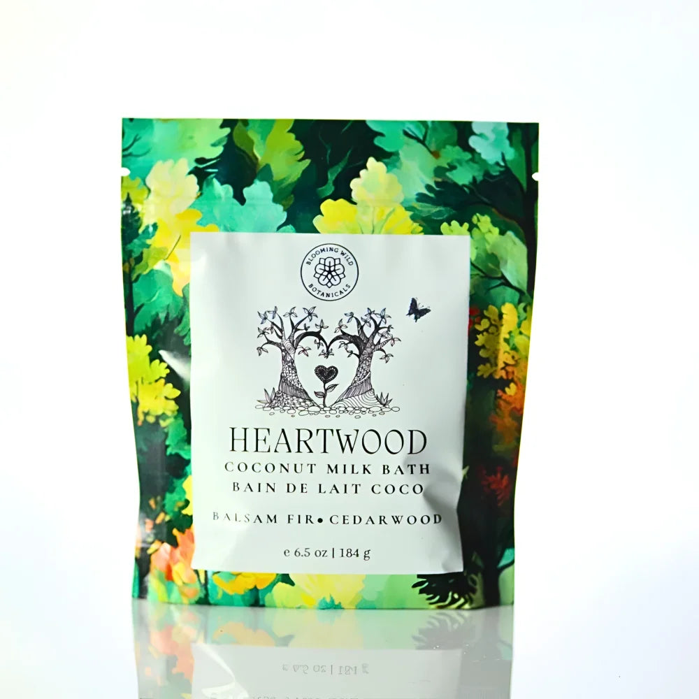Heartwood coconut milk bath salt sachet in vibrant leaf pouch with black white botanical design for milk bath use