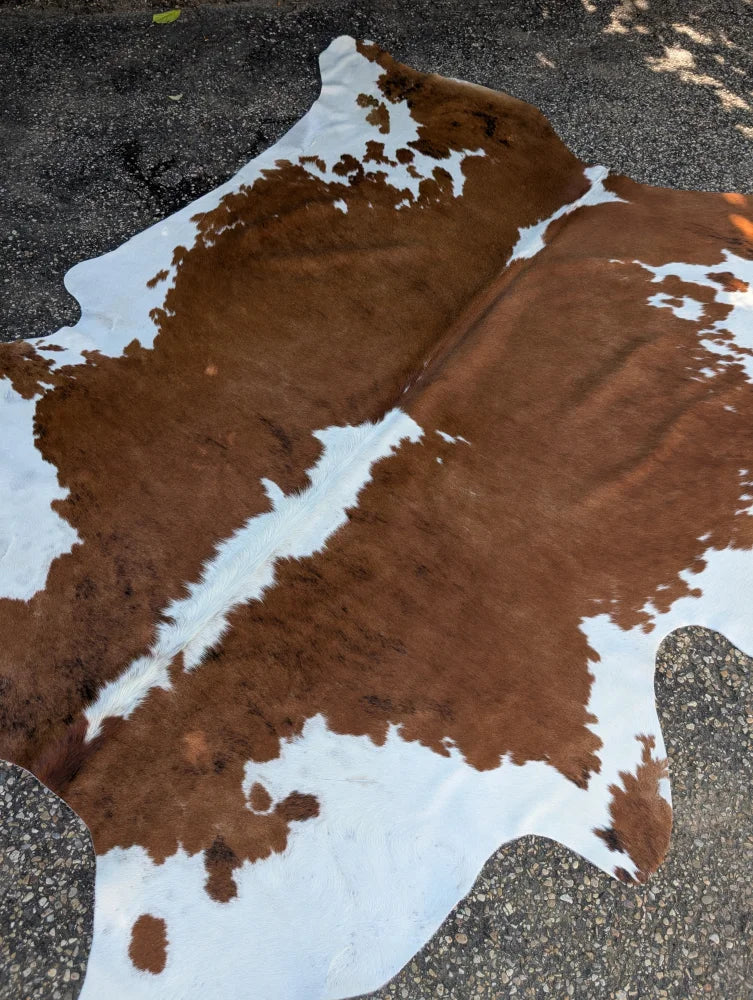 Hello1 large brown and white cowhide rug with natural fur texture and unique characteristics for beautiful rugs