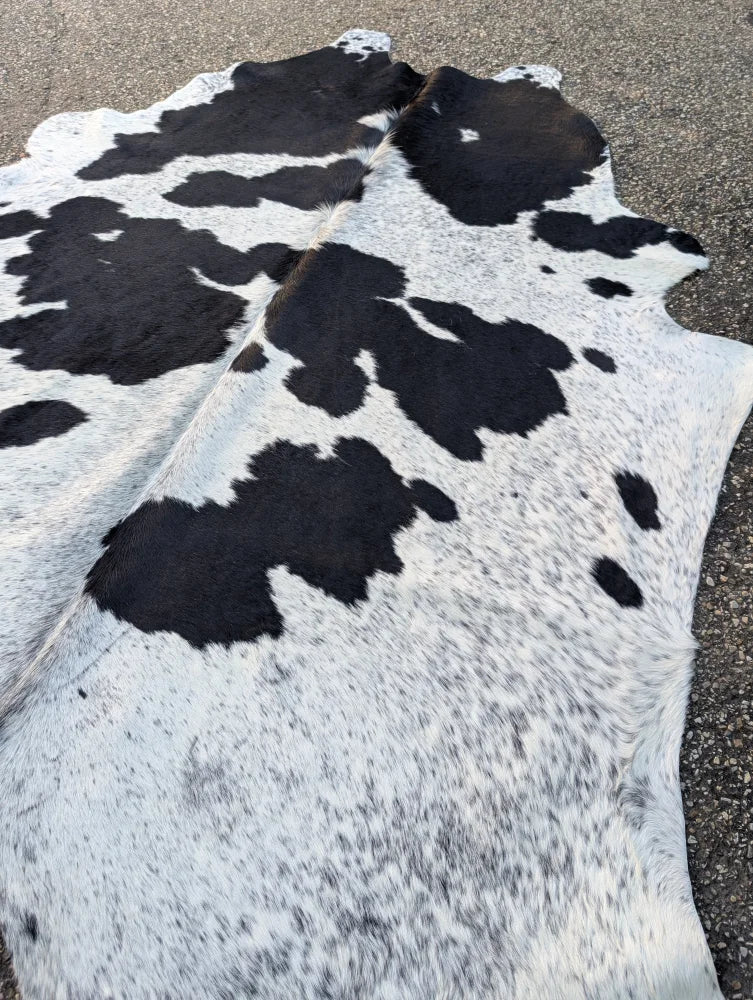 Hello10 large cowhide rug with black and white natural irregular patches adds rustic charm and unique characteristics
