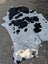 Hello10 92 x 735 large cowhide rug with black and white natural fur texture and unique rustic charm