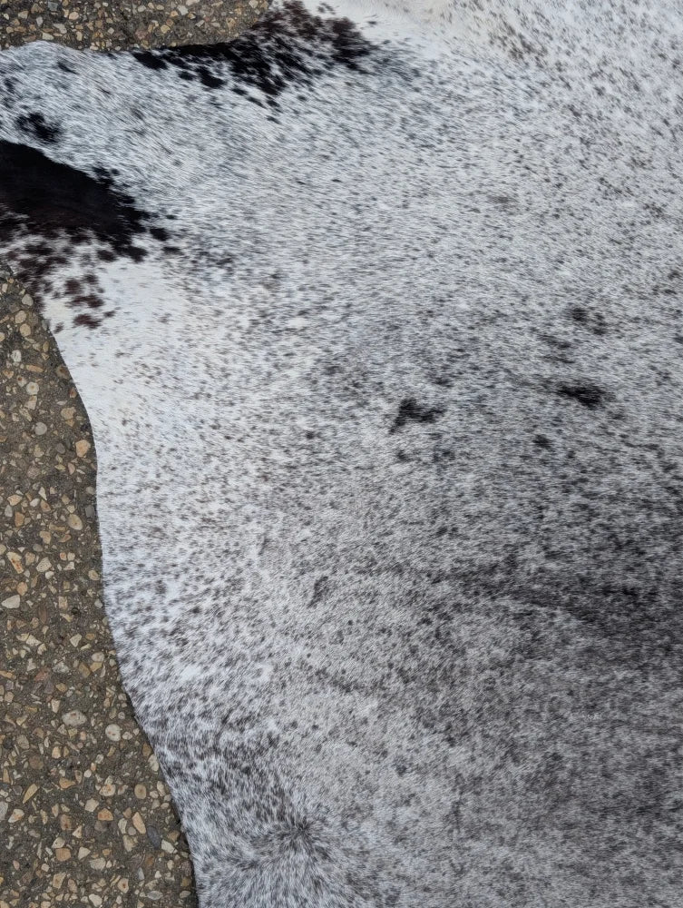 Hello11 large cowhide rug in white and black speckled pattern with unique natural textured surface perfect for beautiful rugs