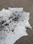 Hello13 extra large cowhide rug in white with black and brown speckles showcasing unique characteristics and beautiful rugs