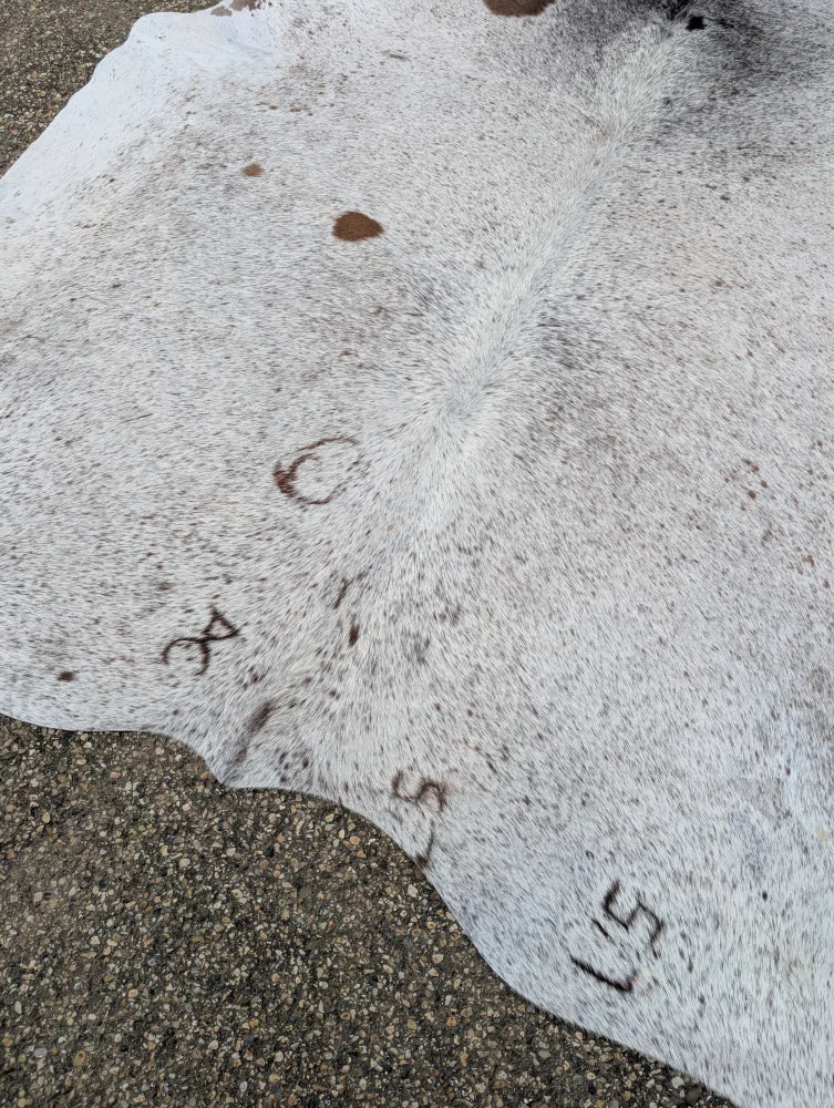 Large cowhide rug hello14 89 x 79 with white gray speckles and brown spots showcasing beautiful rugs unique characteristics